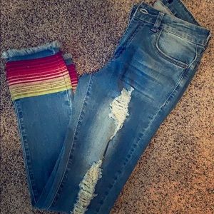 Serape distressed skinny jeans